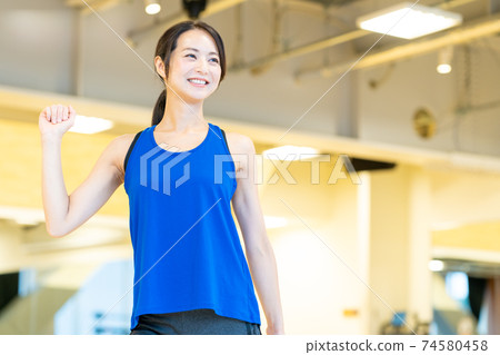 Women's fitness sports gym exercise 74580458