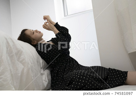 Women painting nails Women painting nails 74581097