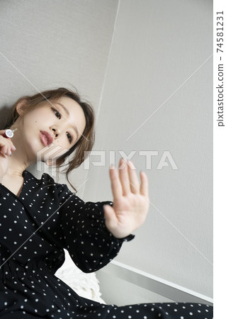 Women painting nails 74581231