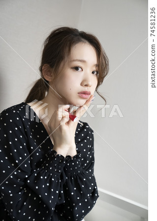 Women painting nails 74581236