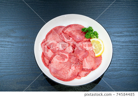 Sliced beef tongue for grilled meat Sliced beef tongue for grilled meat 74584485
