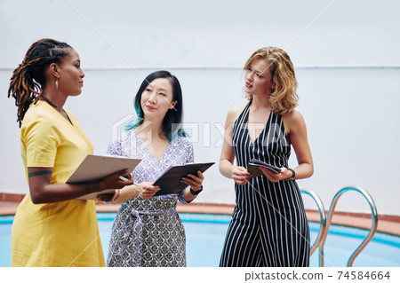 Talking female colleagues 74584664