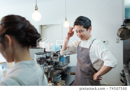 Cafe staff men and women 74587588