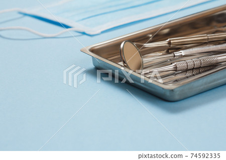 Set of metal dental instruments for teeth dental care Set of metal dental instruments for teeth dental care 74592335