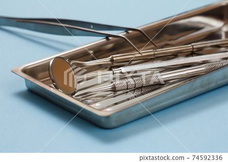 Set of metal dental instruments for teeth dental care Set of metal dental instruments for teeth dental care 74592336