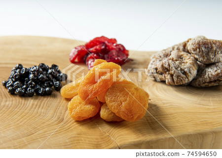 Dried fruits figs apricots raspberries blueberries Dried fruits figs apricots raspberries blueberries 74594650