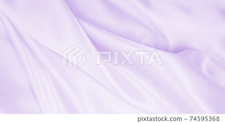 Smooth elegant lilac silk or satin texture as wedding background. Luxurious background design Smooth elegant lilac silk or satin texture as wedding background. Luxurious background design 74595368