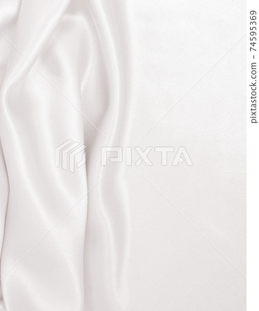 Smooth elegant golden silk or satin luxury cloth texture as wedding background. Luxurious background design. In Sepia toned. Retro style Smooth elegant golden silk or satin luxury cloth texture as wedding background. Luxurious background design. In Sepia toned. Retro style 74595369