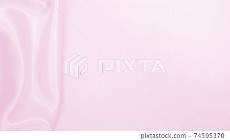 Smooth elegant pink silk or satin texture as wedding background. Luxurious background design Smooth elegant pink silk or satin texture as wedding background. Luxurious background design 74595370