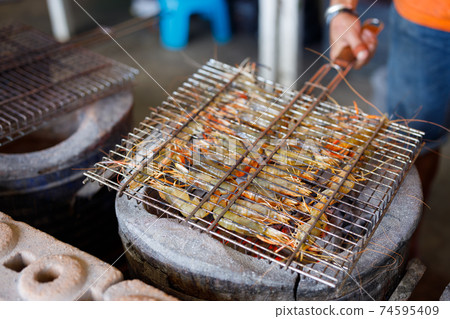 Fresh shrimp grilled seafood  74595409