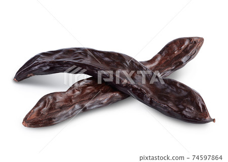Ripe carob pods isolated on white background with clipping path and full depth of field Ripe carob pods isolated on white background with clipping path and full depth of field 74597864