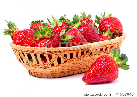 strawberries in a wicker basket isolated on white background strawberries in a wicker basket isolated on white background 74598046