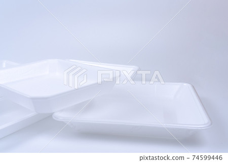 Stacked white food trays Stacked white food trays 74599446