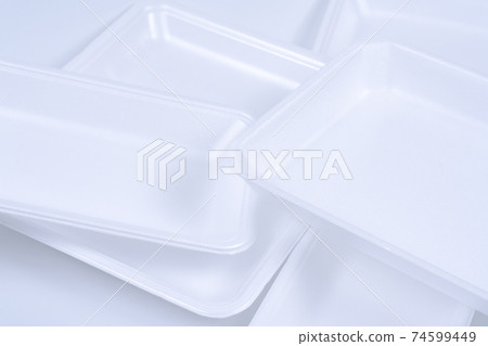 Stacked white food trays Stacked white food trays 74599449