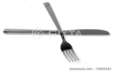 Silver fork and knife isolated on white background Silver fork and knife isolated on white background 74600483