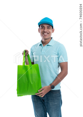 online courier carrying groceries 74600894