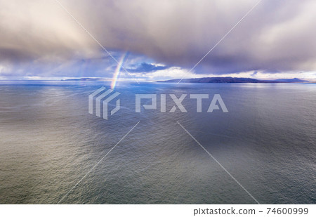 Aerial view of an rainbow above the Atlantic Ocean in Donegal - Ireland Aerial view of an rainbow above the Atlantic Ocean in Donegal - Ireland 74600999
