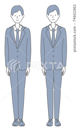 A man in a suit standing straight 74602862