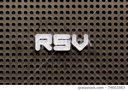 White color letter in word RSV (Respiratory syncytial virus) on black pegboard background 74602983