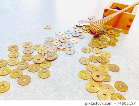 Rake, trout and 5-yen coin Rake, trout and 5-yen coin 74603157