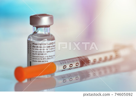 Galati, Romania - February 16, 2021: Pfizer-BioNTech COVID-19 Vaccine "comirnaty" ampoule 74605092