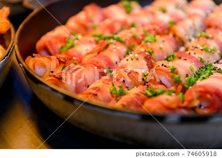 Prawn wrapped with bacon and rosemary. baked appetizer. Close-up shot. 74605918