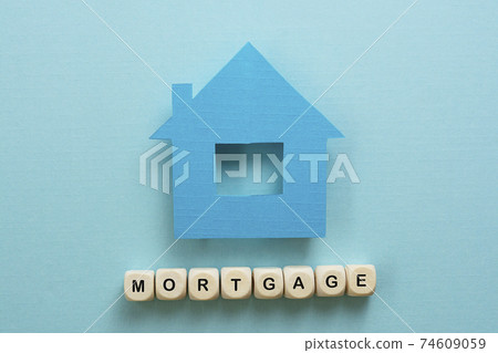 Mortgage word concept blue background Mortgage word concept blue background 74609059