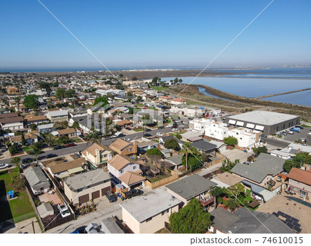 Aerial view of Imperial beach residential area and San Diego Bay on the background, San Diego Aerial view of Imperial beach residential area and San Diego Bay on the background, San Diego 74610015