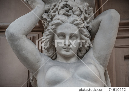 Statue of sensual busty and puffy renaissance era woman in Vienna