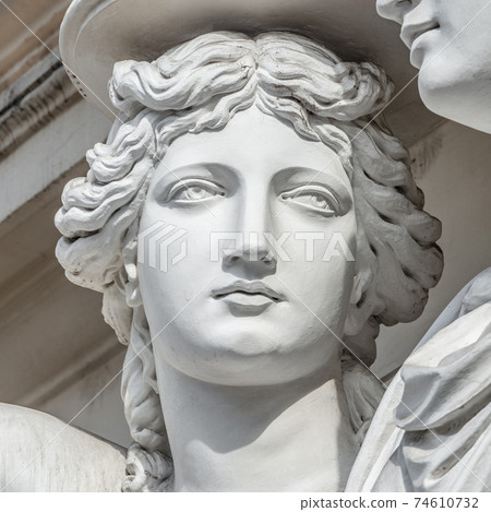 Portrait of balcony support statue of young and naked sensual Roman renaissance era women in Vienna, Austria, details, closeup 74610732