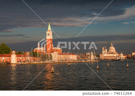 Beautiful Church of San Giorgio Maggiore and its Bell Tower at sunset illumination, Venice, Italy, summer 74611264