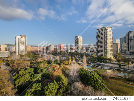 View of Diagonal Mar park, an expensive area with modern high-rise buildings. District close to the sea in Barcelona, Spain. 74611684