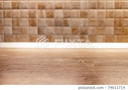 wooden desk space and tiles home background with copy space 74611714