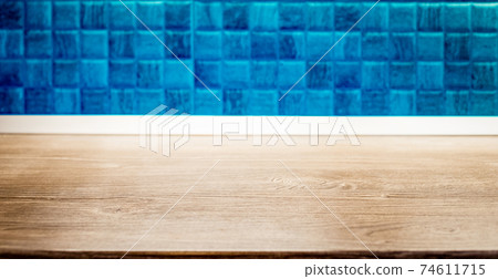 wooden desk space and tiles home background with copy space 74611715
