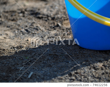 Bucket placed in the park 74612256