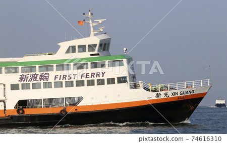 A ferry to a remote island called the First Ferry that goes through Hong Kong Victoria Bay 74616310