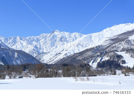 Hakuba in winter, Mt. Goryu in the Northern Alps on a sunny day Hakuba in winter, Mt. Goryu in the Northern Alps on a sunny day 74616333