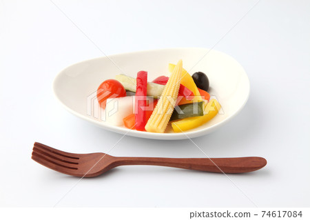 Pickled vegetables pickled in vinegar white background 74617084