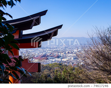 View of Kyoto city through the torii 74617246