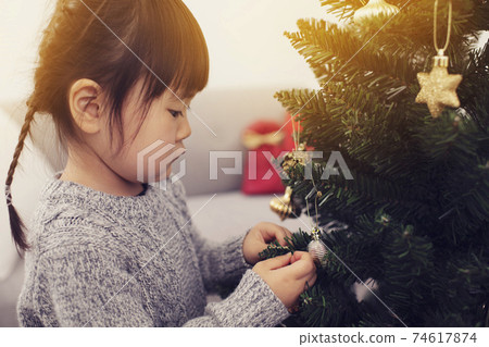 Christmas decorations and girls 74617874