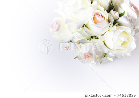 A bouquet of romantic pale pink and white roses (artificial flowers) A bouquet of romantic pale pink and white roses (artificial flowers) 74618859