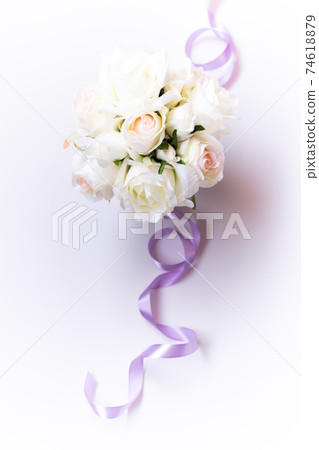 A bouquet of romantic pale pink and white roses (artificial flowers) 74618879