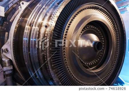 A rotor disc with blades of a turbojet gas turbine engine, inside view. A rotor disc with blades of a turbojet gas turbine engine, inside view. 74618926