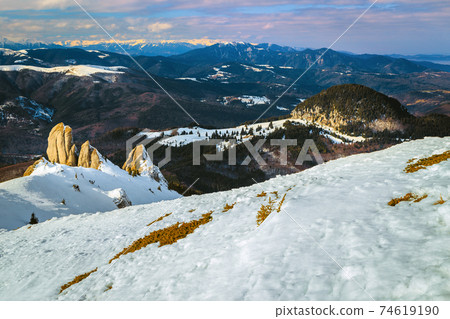 Beautiful winter landscape with snowy slopes, Ciucas, Transylvania, Romania, Europe Beautiful winter landscape with snowy slopes, Ciucas, Transylvania, Romania, Europe 74619190