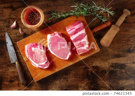 Pork meat, overhead flat lay shot with rosemary 74621345