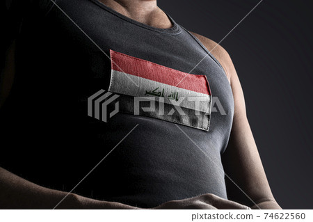The national flag of Iraq on the athlete's chest The national flag of Iraq on the athlete's chest 74622560