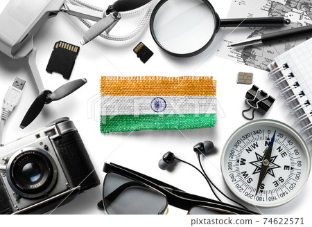 Flag of India and travel accessories on a white background. 74622571
