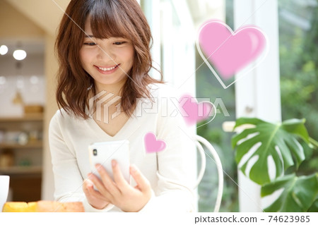 Image of a woman emailing her favorite person Image of a woman emailing her favorite person 74623985