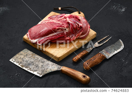 Overhead view of raw lamb shoulder without bone 74624883