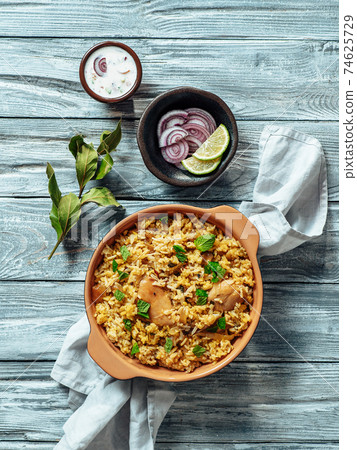 Pakistani chicken biryani rice, top view, copy space Pakistani chicken biryani rice, top view, copy space 74625729
